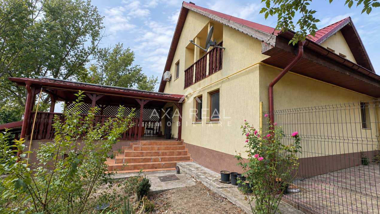 Casă de lemn pe malul lacului, Balotești — 7 camere