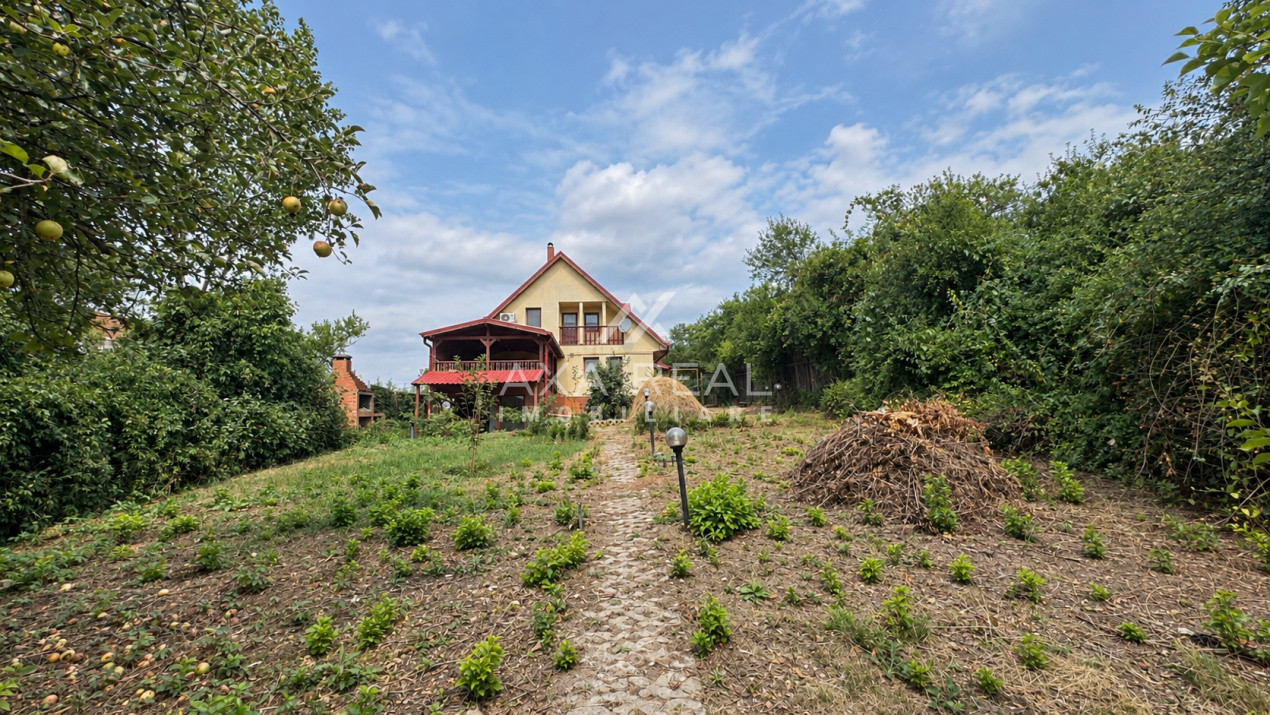 Casă de lemn pe malul lacului, Balotești — 7 camere